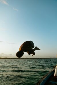 -man-diving-into-the-water-from-a-boat-Mombasa-City